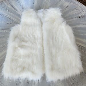Fluffy white vest